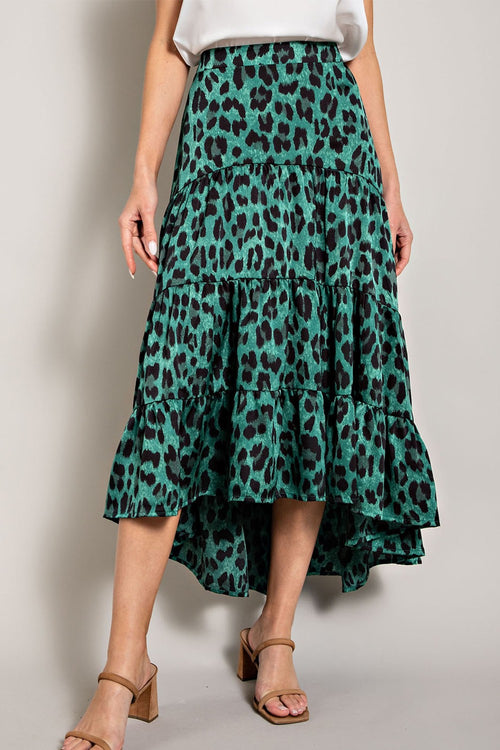 A turquoise and black cheetah midi skirt featuring a flowy fit and high waist.