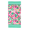 A large beach towel in a pink and green camo print along with green and white stripes on the ends.