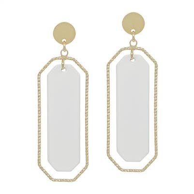 A pair of white and gold dangling earrings in a long rectangle shape.