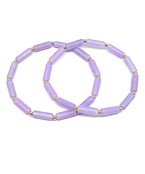 A pair of lilac beaded bracelets.