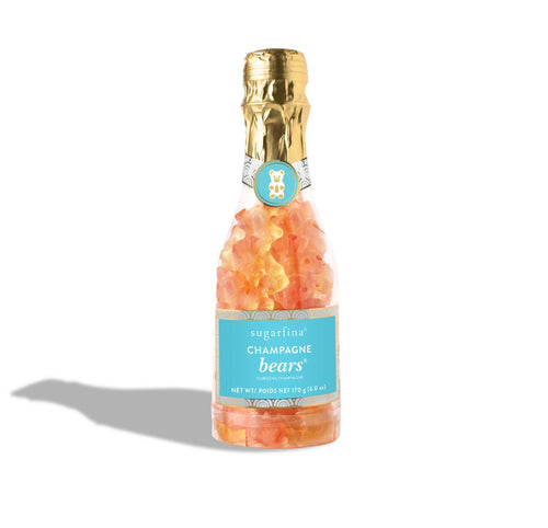 Champagne flavored non-alcoholic gummy bears in a small champagne-shaped bottle.