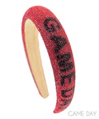 A red and black sparkle headband that reads "game day".