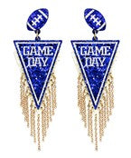 A pair of blue, white, and gold earrings that say "game day" and has a football.