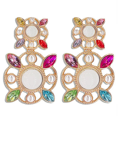 A pair of chunky earrings with multicolored jewels and gold detailing. 