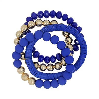 A set of royal blue and gold stretch bracelets.