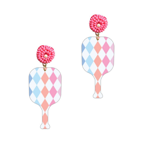 A pair of dangling earrings in the shape of pickleball paddles in a pastel checker print.