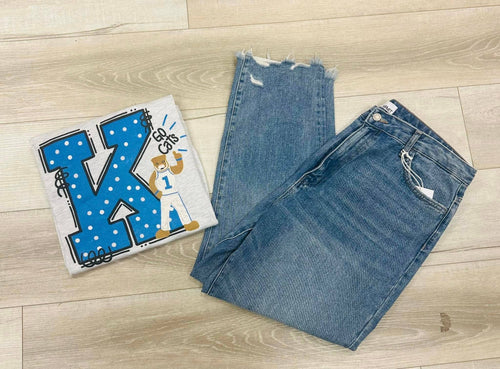 A light heather grey t-shirt with a large blue and white polkadot "K" on it for Kentucky with the University of Kentucky mascot standing in front of it.
