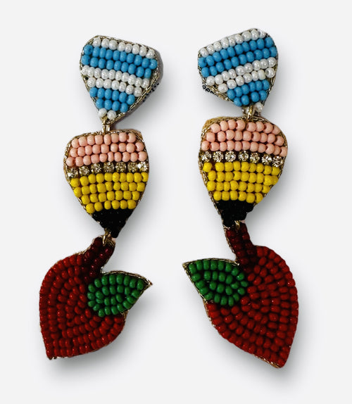 A large beaded pair of multicolored earrings in the design of an apple at the bottom.