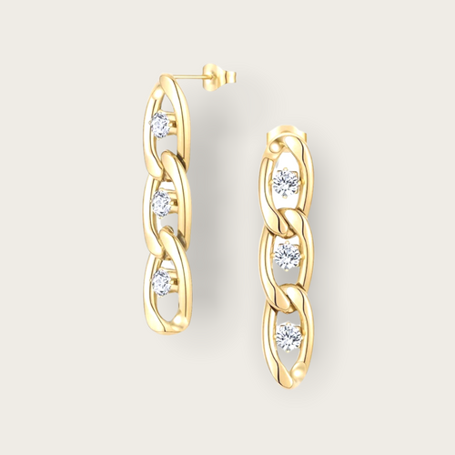 A pair of gold cuban link dangling earrings with diamonds between each link.