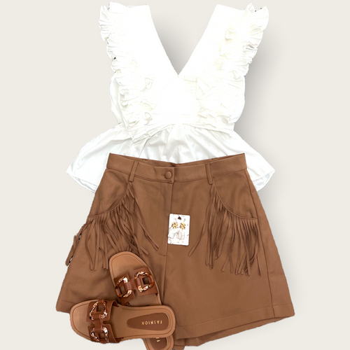 A pair of brown trouser shorts with fringe detailing on the pockets. 