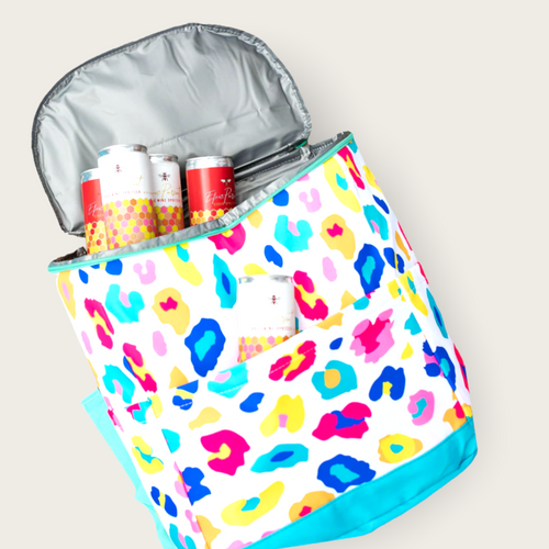 A multicolored cheetah print backpack cooler that can hold various drinks and features multiple outside pockets..