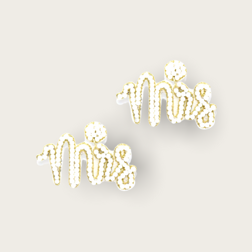 A pair of gold and pearl earrings that say "MRS" on them.
