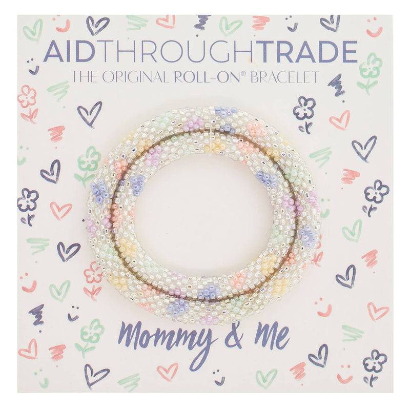 A pastel colored roll-on bracelet featuring a large size for mom and a small size for daughter.