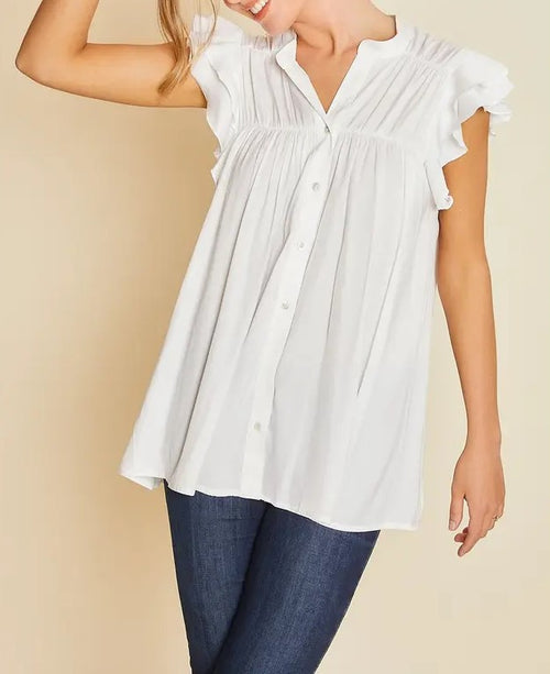 A white sleeveless blouse with buttons down the front and ruffle sleeves.