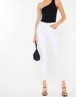 A pair of white straight-cut jeans with a high waist. 