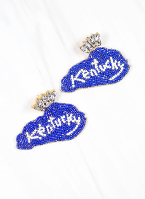 A pair of dangling earrings with beading in the shape of the state of Kentucky with "Kentucky" written in white on a blue background. 