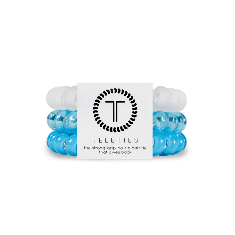 A pack of 3 springy, no-pull, rubber hair ties in the colors white and bright blue.