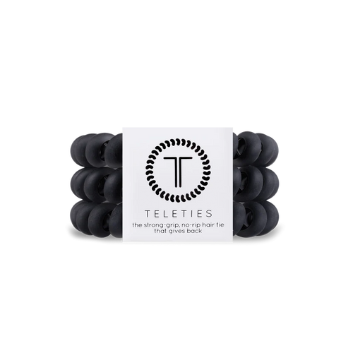 A pack of 3 springy, no-pull, rubber hair ties in the color matte black.