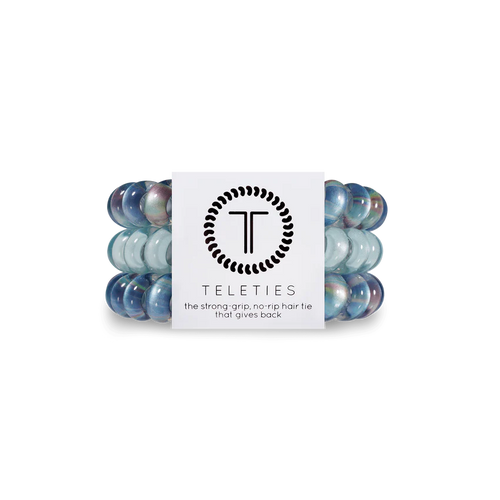 A pack of 3 springy, no-pull, rubber hair ties in the colors dark purple and blue swirl.