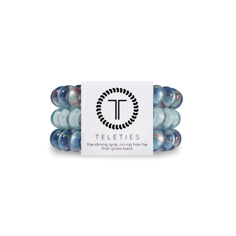 A pack of 3 springy, no-pull, rubber hair ties in the colors dark purple and blue swirl.