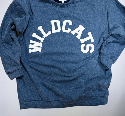 A navy blue heathered crewneck sweatshirt with "wildcats" in a curved white block font.